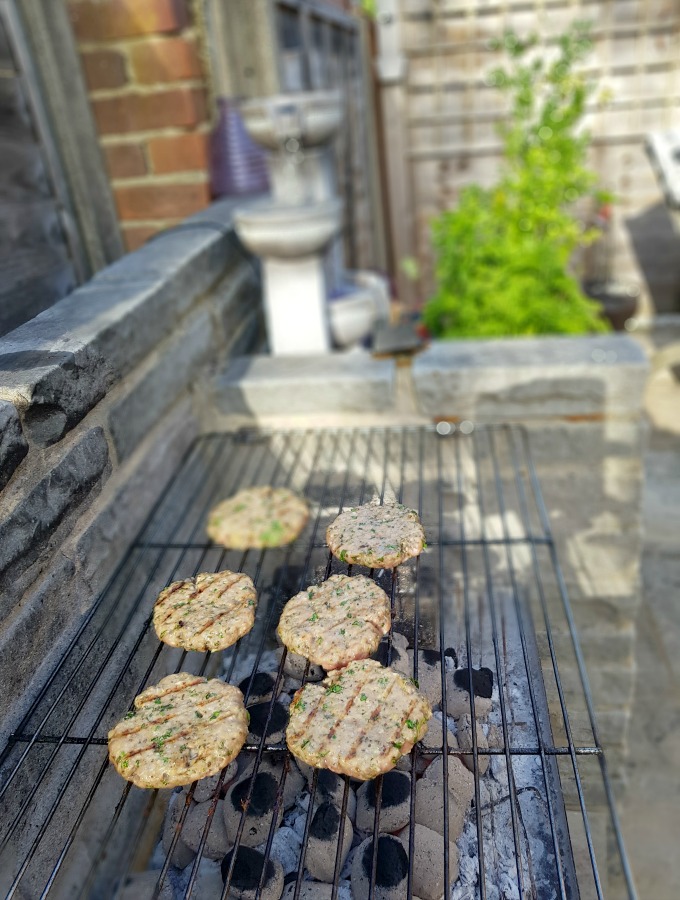 barbecuing lamb burgers