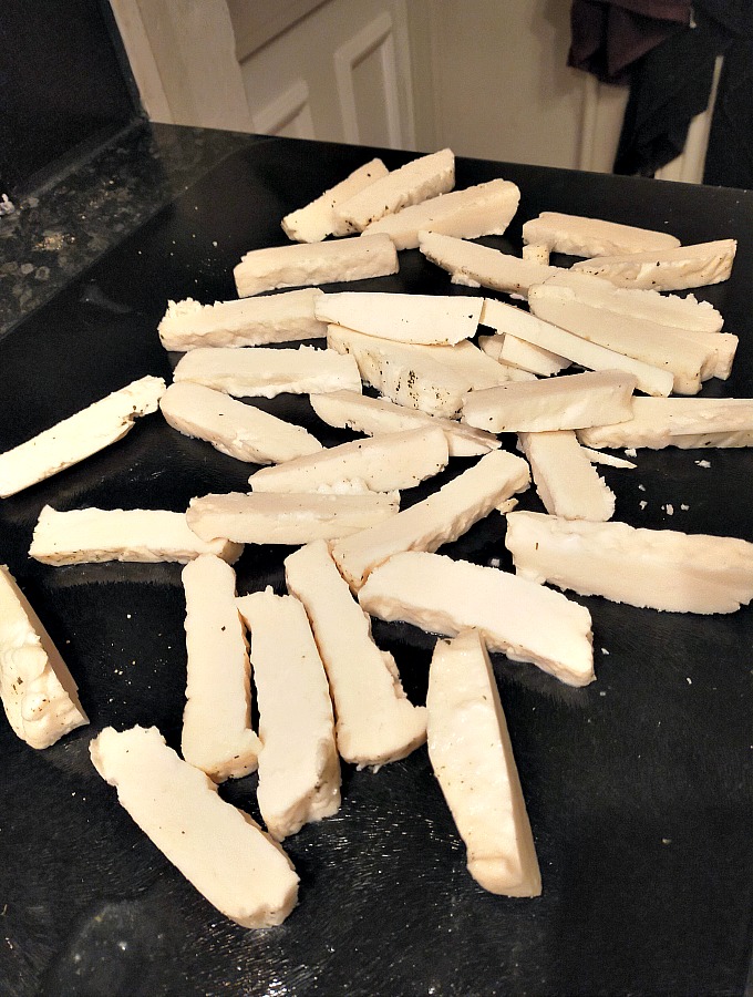 cutting halloumi into strips