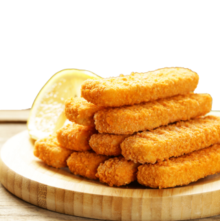 fish fingers on a wooden chopping board